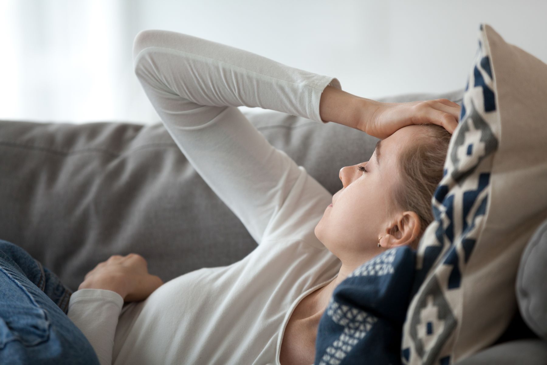 Distressed woman struggling with purging