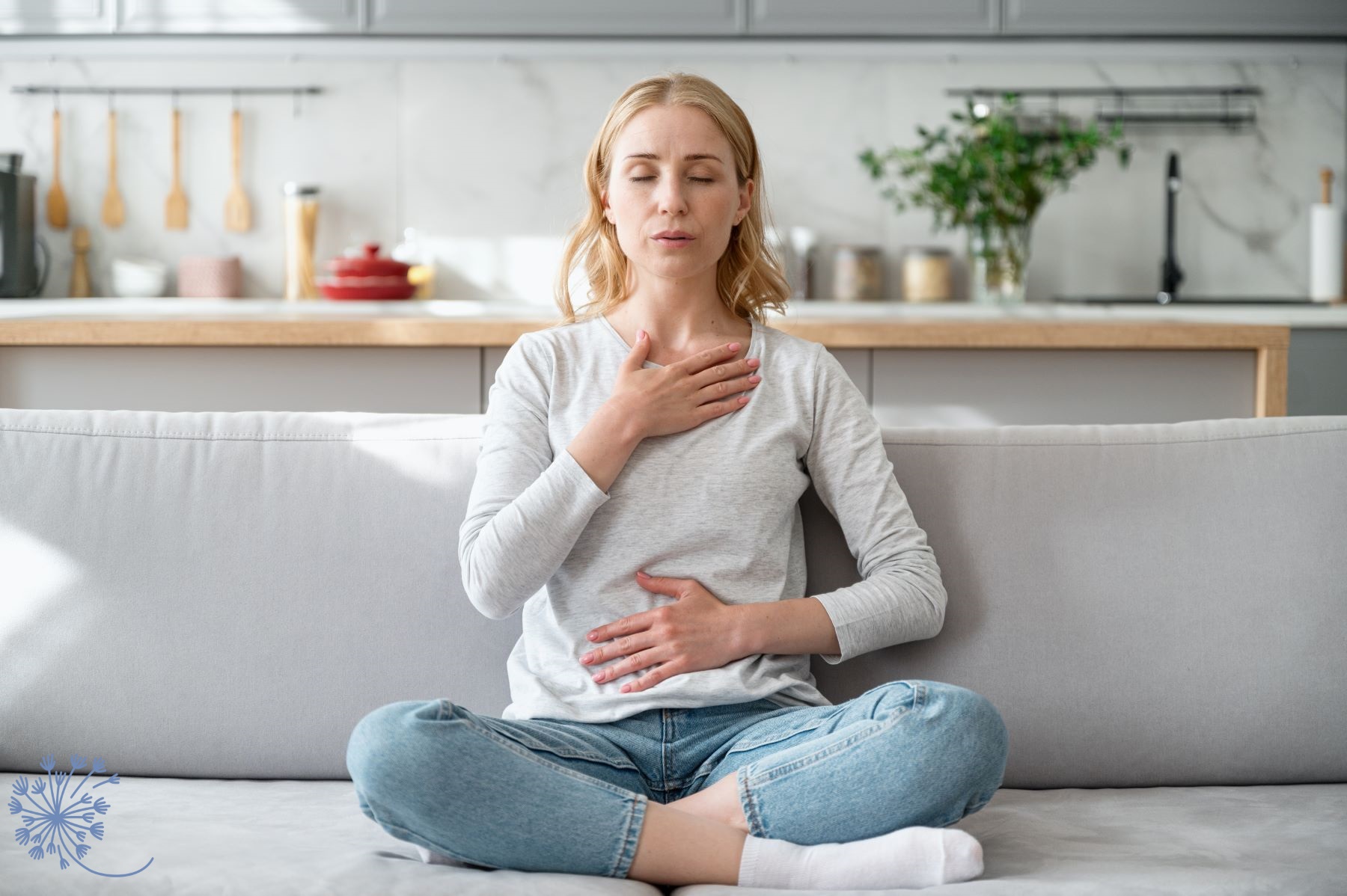 Person sitting with upset stomach